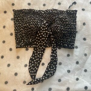 Floral black SHEIN tube top size medium. Very stretchy material.